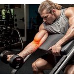 Biceps tendonitis will hurt in the front of the shoulder and may radiate down the upper arm